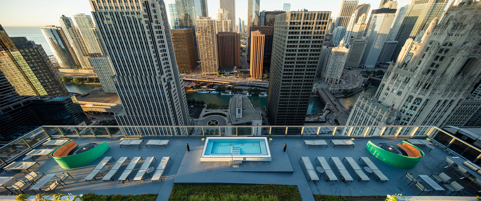 A bird's eye view of the patio shows that it overlooks many Chicago skyscrapers and the Chicago River.