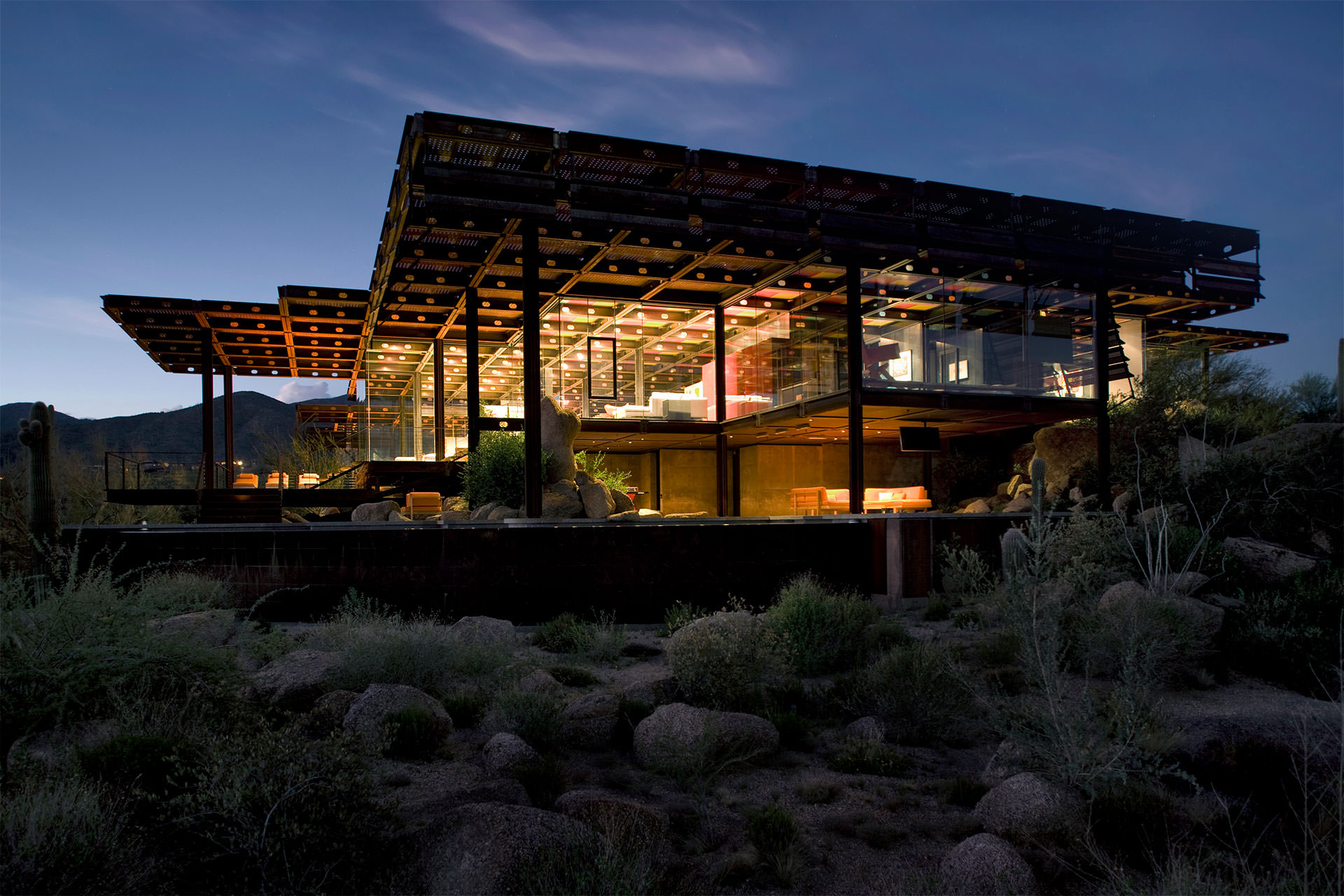 View of the house within the desert at night